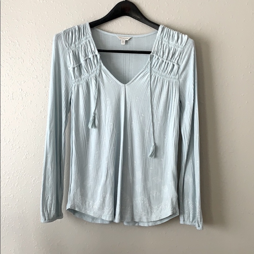 Blouse with tassels